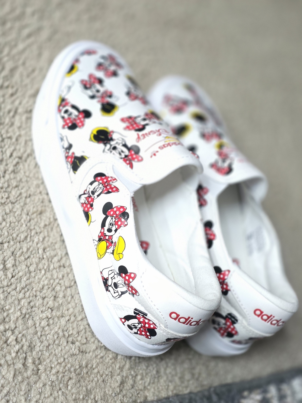 adidas White Kids Slip-On Sneakers with Red and Yellow Minnie Print